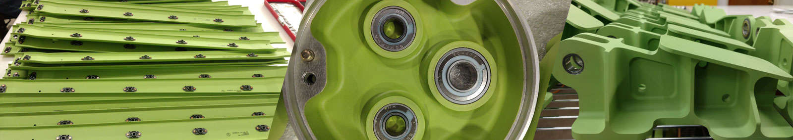 Assembly line with green plastic parts on a conveyor belt.