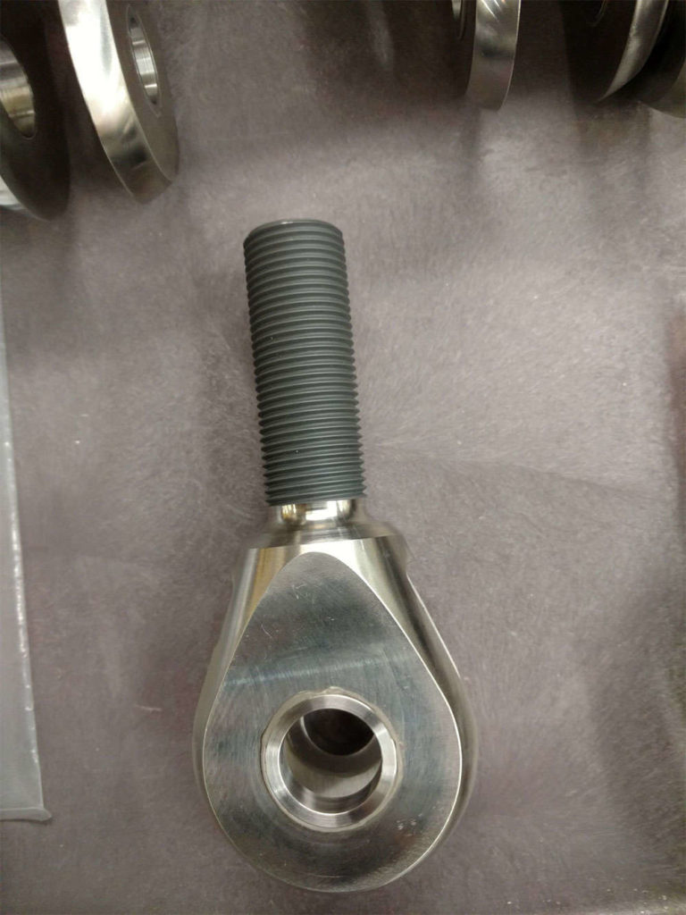 A table with stainless steel parts assembled and integrated.