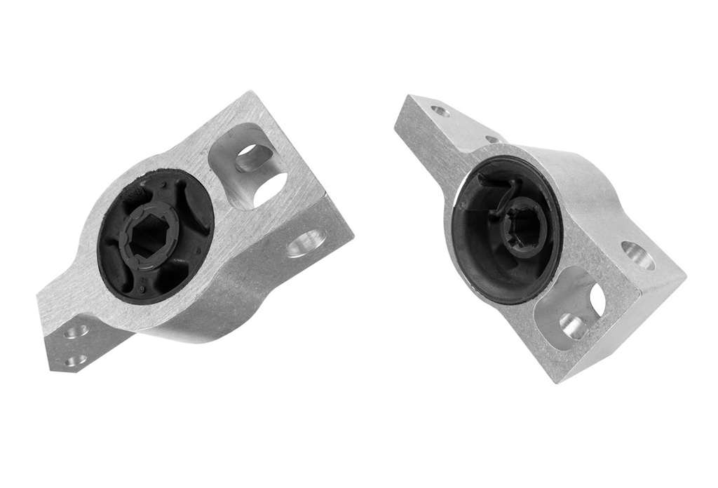 Two aluminum brackets on a white background, ready for bushing installation.