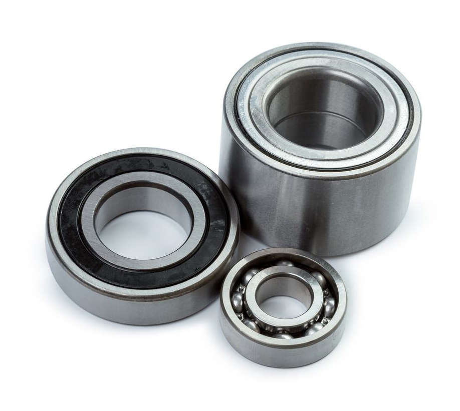 A set of bearings and bushing installation on a white background.